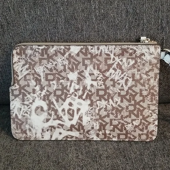 Nwt DKNY medium brown graffiti wristlet. Retails $78 - Picture 8 of 8
